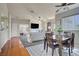 Open living space showing dining room, living room, and open bedroom in background at 2325 Windmill Pkwy # 321, Henderson, NV 89074