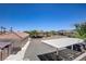 Overhead view of covered parking in a well-maintained community with desert landscaping and scenic mountain views at 2325 Windmill Pkwy # 321, Henderson, NV 89074
