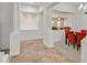Open entryway that leads into a living room with large windows and ample natural light at 2410 Sunburst View St, Henderson, NV 89052