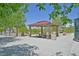Community gazebo with covered picnic area, concrete floors, landscaping, and plenty of open space at 2410 Sunburst View St, Henderson, NV 89052