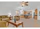 Open-concept living room and kitchen area perfect for entertaining and Gathering gatherings at 2410 Sunburst View St, Henderson, NV 89052
