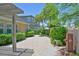 Backyard patio features beautiful landscaping, a fountain and a pergola at 2410 Sunburst View St, Henderson, NV 89052