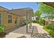 Charming backyard patio with pergola, grill, and beautiful brick pavers for outdoor living at 2410 Sunburst View St, Henderson, NV 89052