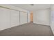 The spacious bedroom includes neutral carpet, an abundance of closet space, and a window at 2633 S Durango Dr # 204, Las Vegas, NV 89117