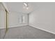 The light and bright bedroom features neutral carpet, a window, and mirrored closet doors at 2633 S Durango Dr # 204, Las Vegas, NV 89117