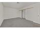 The large bedroom offers neutral carpet, a closet with organizers, and access to another room at 2633 S Durango Dr # 204, Las Vegas, NV 89117