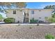 Two story condominium with exterior stairs and desert landscaping at 2633 S Durango Dr # 204, Las Vegas, NV 89117
