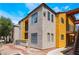Exterior view of an apartment building featuring stairwells, balconies, and minimal landscaping at 2700 N Rainbow Blvd # 1080, Las Vegas, NV 89108