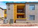 Apartment building featuring multiple units, small balconies, and desert-friendly xeriscaping at 2700 N Rainbow Blvd # 1080, Las Vegas, NV 89108