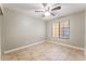 Bedroom featuring tile flooring, baseboards, a ceiling fan, and natural light at 2700 N Rainbow Blvd # 1080, Las Vegas, NV 89108