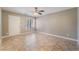 Bedroom featuring tile flooring, baseboards, and a window at 2700 N Rainbow Blvd # 1080, Las Vegas, NV 89108
