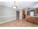 Dining area featuring tile floors, stylish light fixture, and views of the kitchen at 2700 N Rainbow Blvd # 1080, Las Vegas, NV 89108