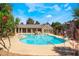 Inviting community pool with a waterfall feature and ample seating area, perfect for relaxation and leisure at 2700 N Rainbow Blvd # 1080, Las Vegas, NV 89108