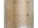 Bathroom shower with tan tile surround and brushed nickel fixtures at 2700 N Rainbow Blvd # 1080, Las Vegas, NV 89108