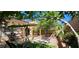 Charming backyard featuring a swing, pergola, greenery, and a well-maintained grill at 3131 Binaggio Ct, Las Vegas, NV 89141