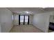 A simple and bright bedroom with natural light and neutral carpet at 3131 Binaggio Ct, Las Vegas, NV 89141