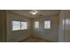 Bright room featuring windows and exterior views, creating a pleasant and airy atmosphere at 3131 Binaggio Ct, Las Vegas, NV 89141
