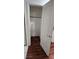 A walk-in closet features wood floors, neutral walls, and a clothing rod at 3131 Binaggio Ct, Las Vegas, NV 89141