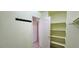 An organized walk-in closet features shelving and hanging storage space at 3131 Binaggio Ct, Las Vegas, NV 89141