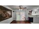 Charming dining area with wood floors, wall decor, and natural light at 3131 Binaggio Ct, Las Vegas, NV 89141