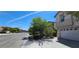 Two-story home featuring a two car garage and landscaped front yard with street view at 3131 Binaggio Ct, Las Vegas, NV 89141