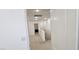 Bright upstairs hallway showcasing recessed lighting and access to other living spaces at 3131 Binaggio Ct, Las Vegas, NV 89141