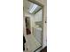 Bright laundry room with white washer, dryer, and upper cabinets at 3131 Binaggio Ct, Las Vegas, NV 89141