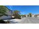 Exterior shot of home showing street, sidewalk and other homes in the neighborhood at 3131 Binaggio Ct, Las Vegas, NV 89141