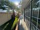 Backyard with artificial grass and direct access to the property through the sliding door at 3136 Jane Austin Ave, North Las Vegas, NV 89031