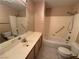 Full bath featuring a single sink vanity, bathtub, and toilet at 3136 Jane Austin Ave, North Las Vegas, NV 89031
