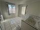 Bathroom with tile flooring, tub and exterior door at 3136 Jane Austin Ave, North Las Vegas, NV 89031