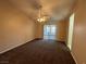Cozy bedroom with ceiling fan and sliding glass doors to sunroom, carpeted flooring at 3136 Jane Austin Ave, North Las Vegas, NV 89031