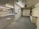 Spacious two car garage with storage cabinets and work space at 3136 Jane Austin Ave, North Las Vegas, NV 89031