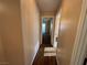 Hallway with wood laminate flooring at 3136 Jane Austin Ave, North Las Vegas, NV 89031