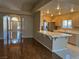Open layout featuring living room, breakfast bar, and kitchen at 3136 Jane Austin Ave, North Las Vegas, NV 89031