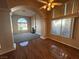 Spacious living room featuring hardwood floors, archways, and natural light at 3136 Jane Austin Ave, North Las Vegas, NV 89031