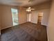 Main bedroom features ceiling fan, with ensuite bathroom and walk in closet at 3136 Jane Austin Ave, North Las Vegas, NV 89031