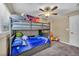 This is a cozy ' bedroom that features a bunk bed and has carpet throughout at 3232 Brayton Mist Dr, North Las Vegas, NV 89081