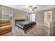 Comfortable bedroom with neutral walls, ceiling fan, carpet, and plenty of natural light at 3232 Brayton Mist Dr, North Las Vegas, NV 89081