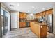 Well-equipped kitchen featuring stainless steel appliances and a central island at 3232 Brayton Mist Dr, North Las Vegas, NV 89081