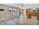 Open living area with seamless transition to the kitchen and backyard access at 3232 Brayton Mist Dr, North Las Vegas, NV 89081
