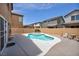 Sparkling private pool and spa surrounded by a walled backyard for ultimate relaxation at 3232 Brayton Mist Dr, North Las Vegas, NV 89081