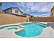 Backyard view of the pool and jacuzzi at 3232 Brayton Mist Dr, North Las Vegas, NV 89081