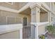 Charming townhouse entrance with a gated porch, decorative tile, and a welcoming door at 3253 Mystic Ridge Ct, Las Vegas, NV 89129