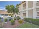 Well-manicured landscaping with lush green bushes and colorful flowerbeds at 3253 Mystic Ridge Ct, Las Vegas, NV 89129