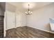View of dining area and staircase featuring hardwood flooring and neutral walls at 3253 Mystic Ridge Ct, Las Vegas, NV 89129