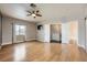 Spacious main bedroom with ceiling fan, hardwood floors, and closet space at 3253 Mystic Ridge Ct, Las Vegas, NV 89129