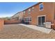 The backyard has a patio, barbecue, and a rock area that is ready for your landscape ideas at 334 E Neal Ave, Las Vegas, NV 89183
