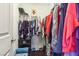 Walk-in closet featuring organized clothing racks and shelving at 334 E Neal Ave, Las Vegas, NV 89183