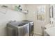 Laundry room equipped with modern washer and dryer units and storage at 334 E Neal Ave, Las Vegas, NV 89183